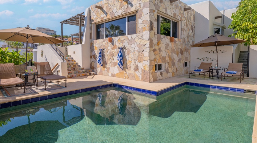 Lounge by the sunny poolside