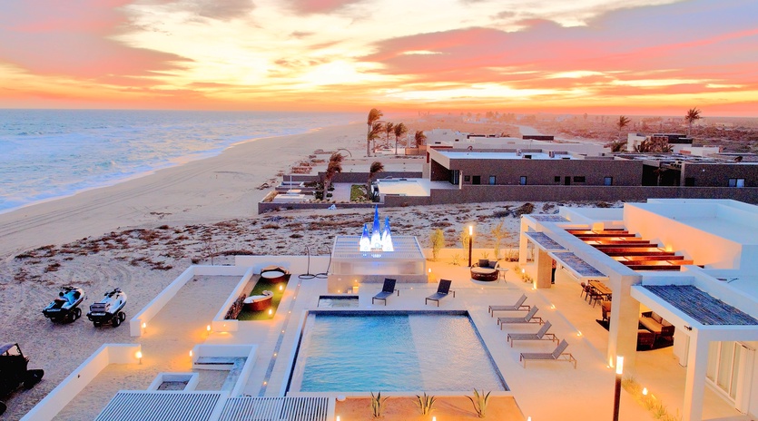 Patio during sunset with beachfront views