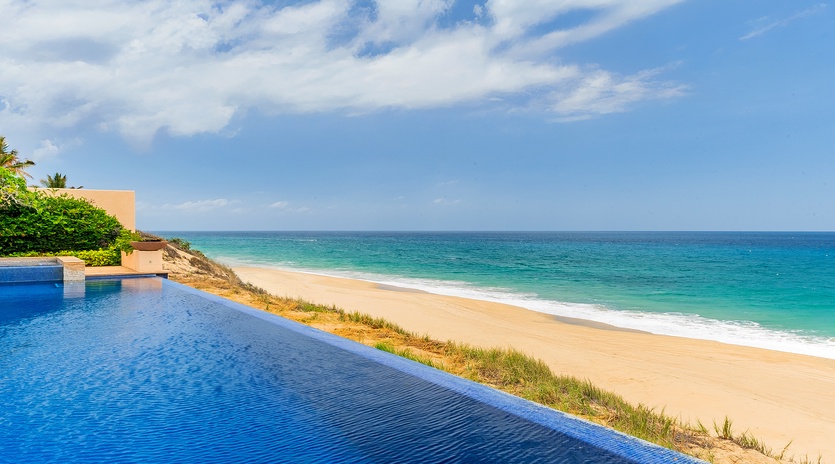 Infinity pool with breathtaking beach views