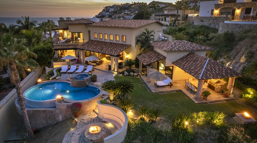 Bird's eye view of villa during sunset