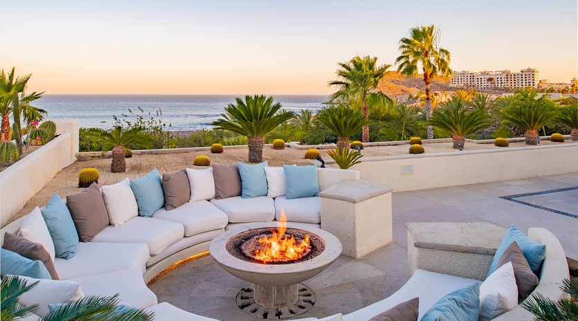 Firepit with outdoor seating and ocean views