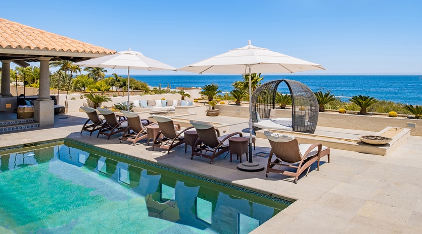 Sunny poolside with incredible ocean views