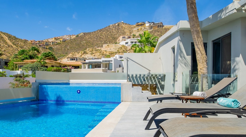 Sunny patio with lounge chairs
