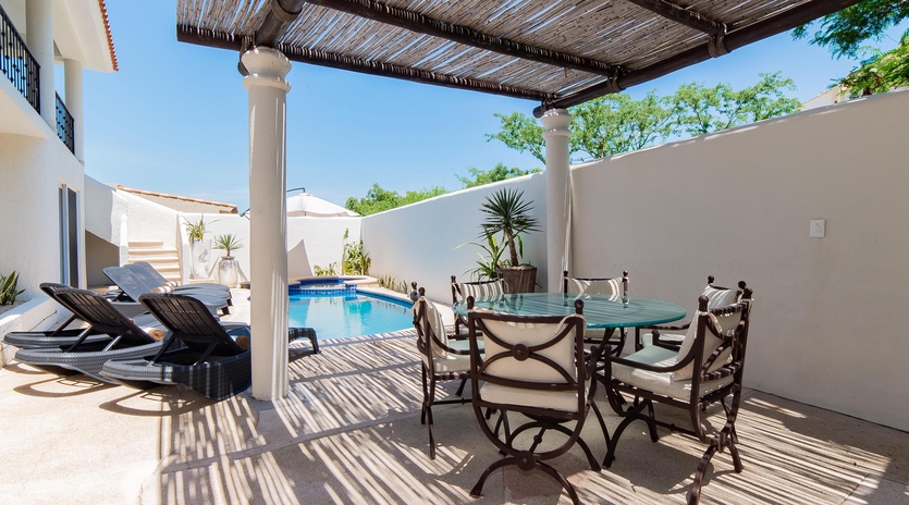 Inviting outdoor terrace with swimming pool, jacuzzi and patio furniture