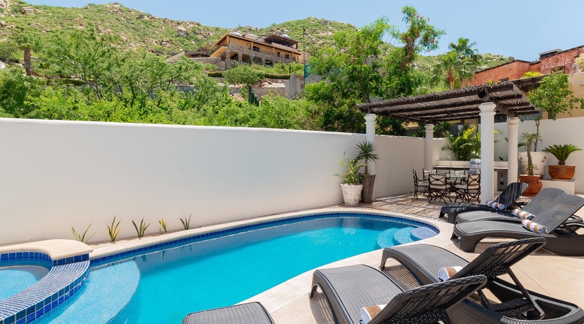 Inviting outdoor terrace with swimming pool, jacuzzi and patio furniture