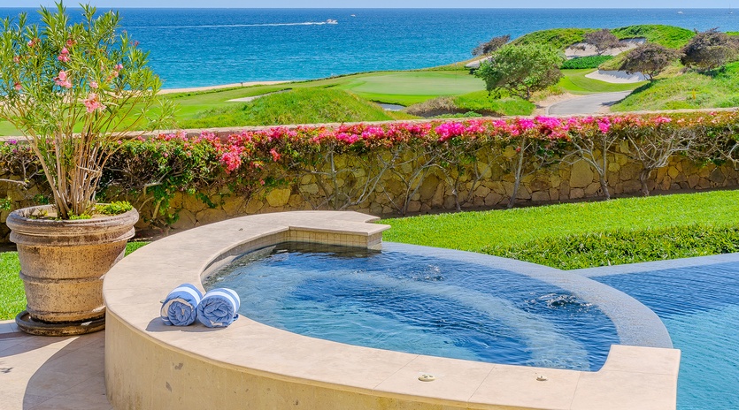 Poolside with incredible ocean and golf course views