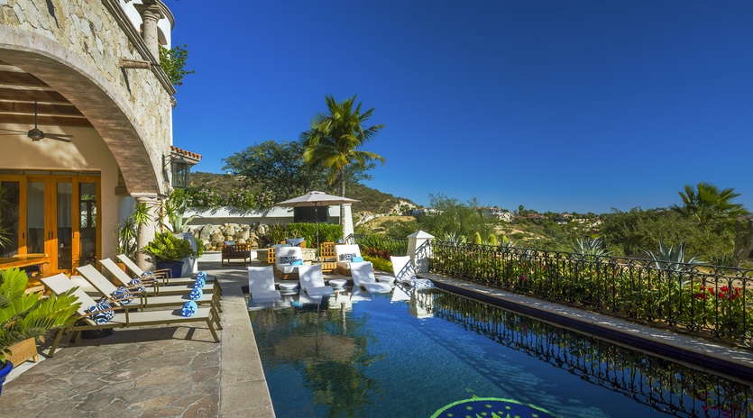 Your private infinity pool terrace offers stunning loungers and shade, perfect for soaking up the tropical paradise atmosphere.