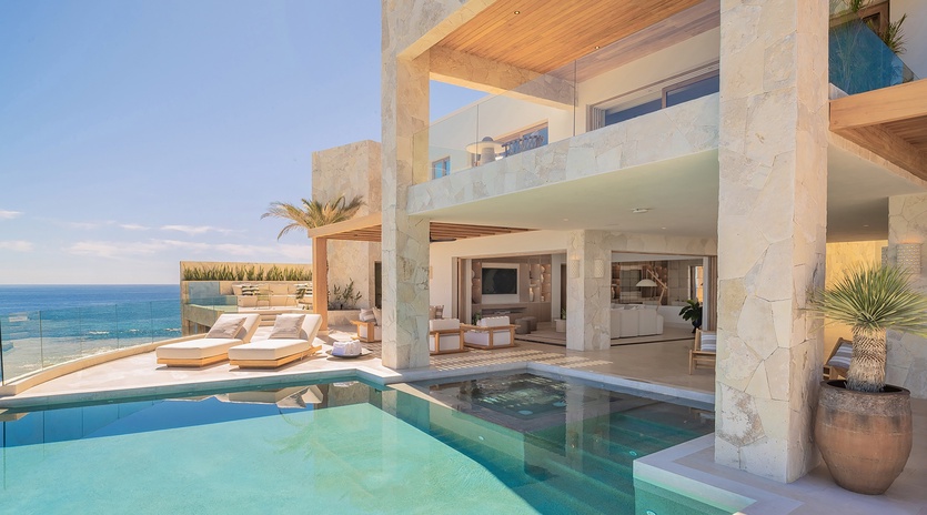 Poolside view of patio with ocean views