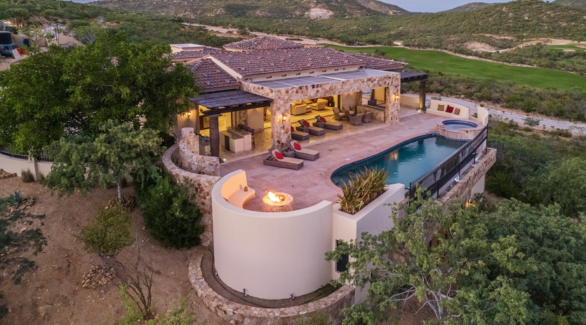 Bird's eye view of villa during sunset