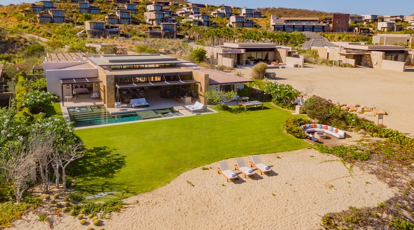 Villa exterior and beachfront setting