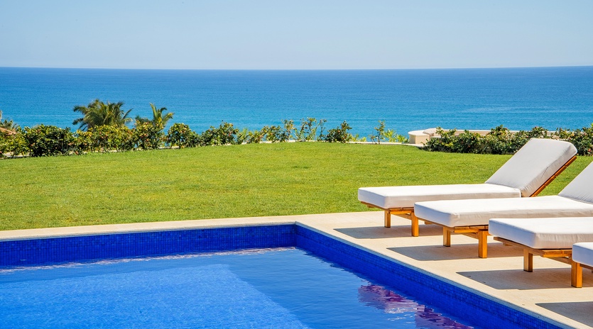 Sunny poolside with incredible ocean views