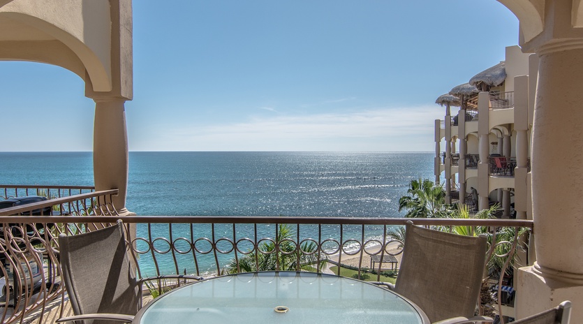 Balcony with beachfront and ocean views