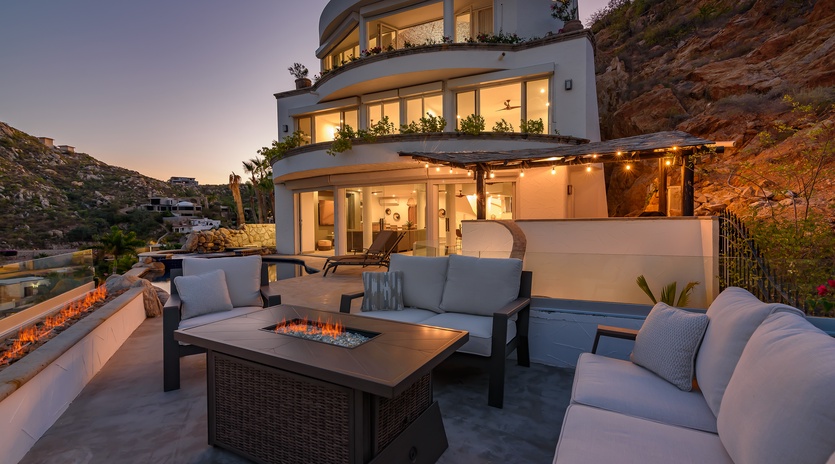 Sit by the cozy fire during sunset