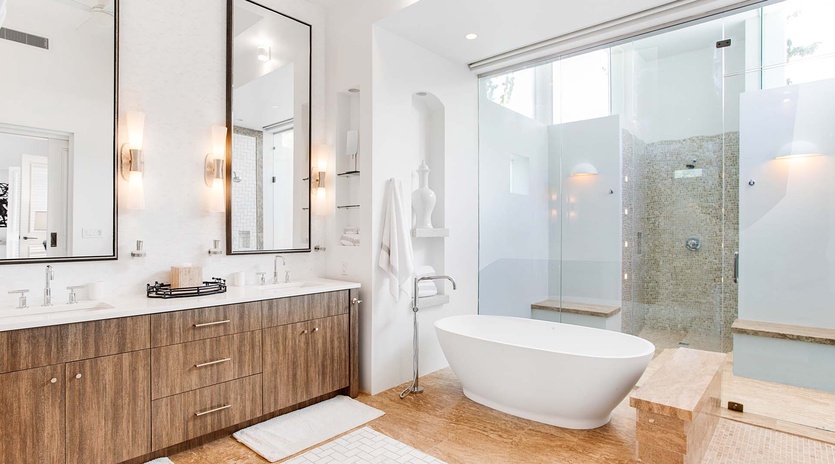 Step into your private sanctuary where a luxurious soaking tub and spa-like shower await. Warm wood tones and elegant fixtures create the perfect space to unwind after your adventures.