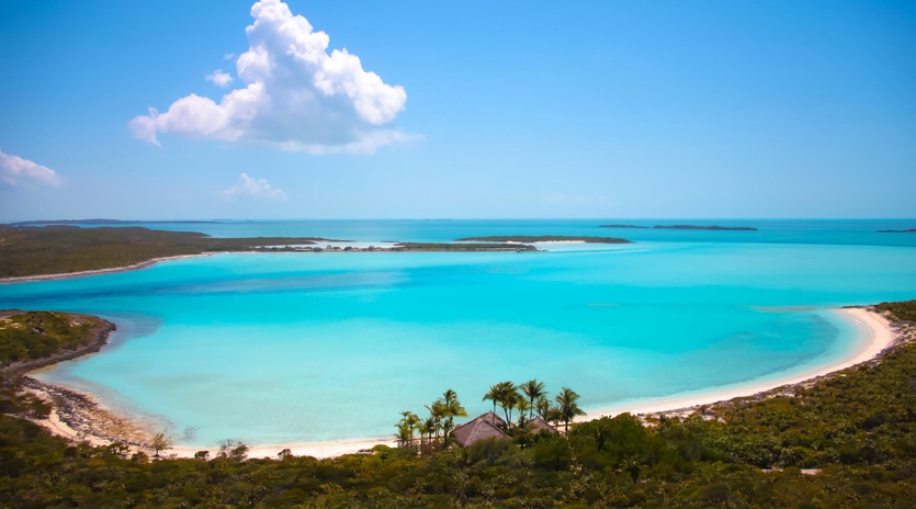 Pristine turquoise waters and white sand beaches create a stunning tropical paradise in this secluded island location.