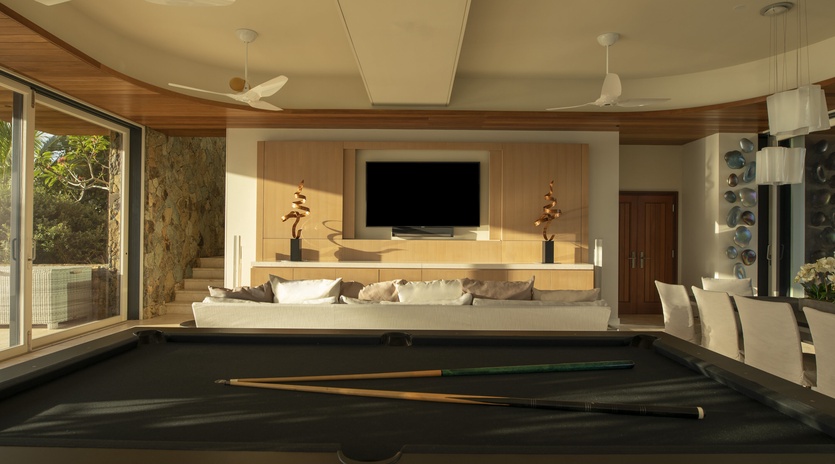 Challenge friends to billiards in your stylish entertainment lounge, complete with plush seating and mountain views.