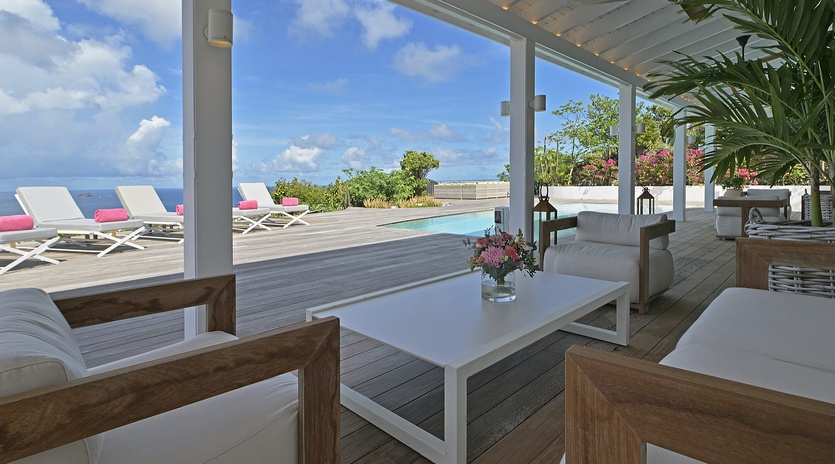 Relax in your private covered terrace with stunning ocean views and pool access.