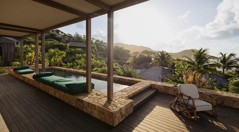 Sink into your private hot tub with plush cushions, watching tropical palms sway while mountains frame the horizon from your covered deck.