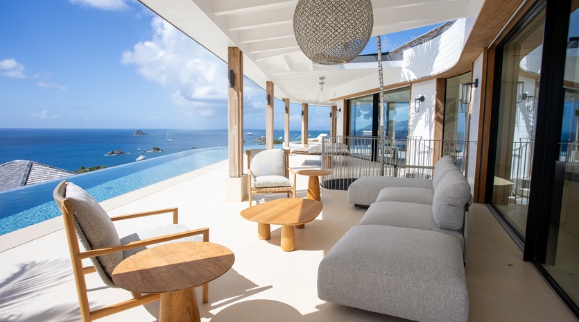 Unwind on your private terrace with stunning sea views, infinity pool, and luxurious seating perfect for morning coffee or sunset cocktails.