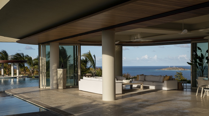 Step into your open-air sanctuary where modern luxury meets tropical paradise, with stunning ocean vistas framing your private poolside retreat.