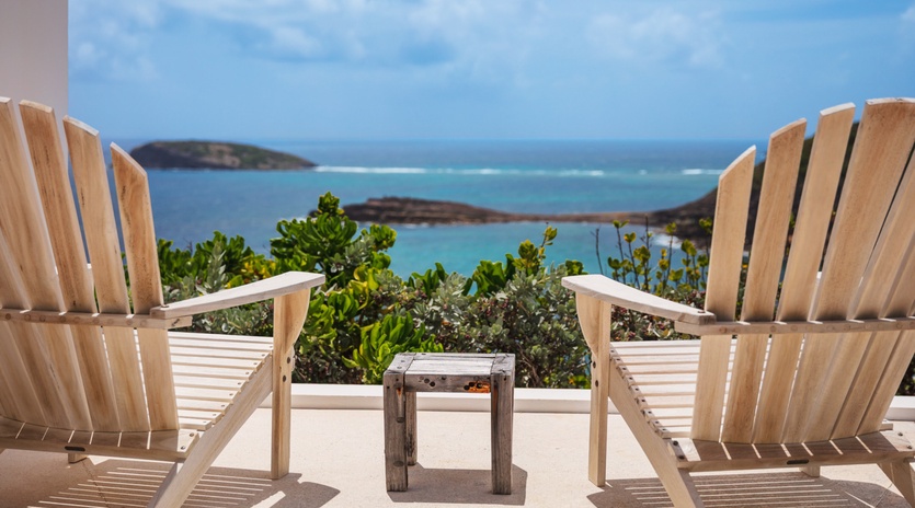 Panoramic coastal vista featuring turquoise waters, small islands, and lush coastal vegetation—defining the scenic area surrounding this vacation rental property.