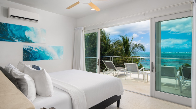 Wake up to breathtaking ocean views from your bright bedroom, where tropical breezes flow through sliding doors to your private balcony.