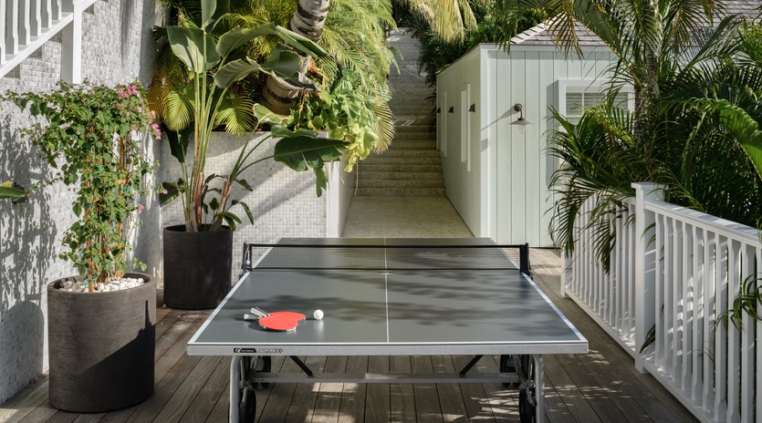 Challenge friends to ping pong matches on your private tropical terrace, surrounded by swaying palms and lush greenery.