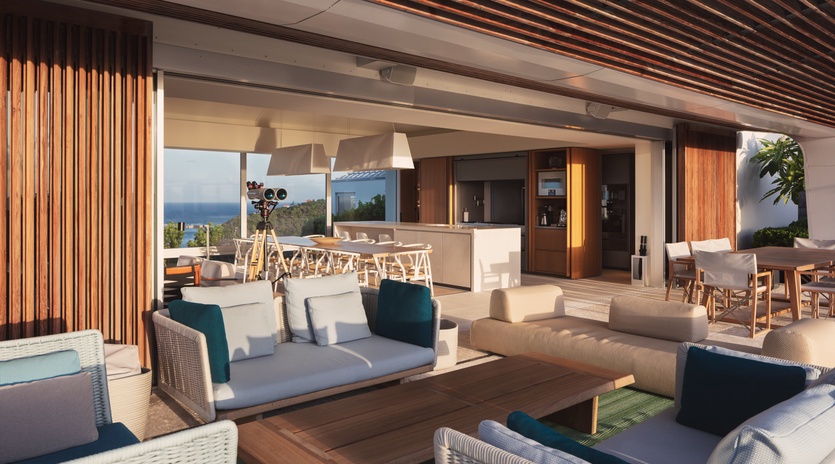 Unwind in this stunning open-concept living space where modern comfort meets coastal elegance, with panoramic ocean views framing your every moment.