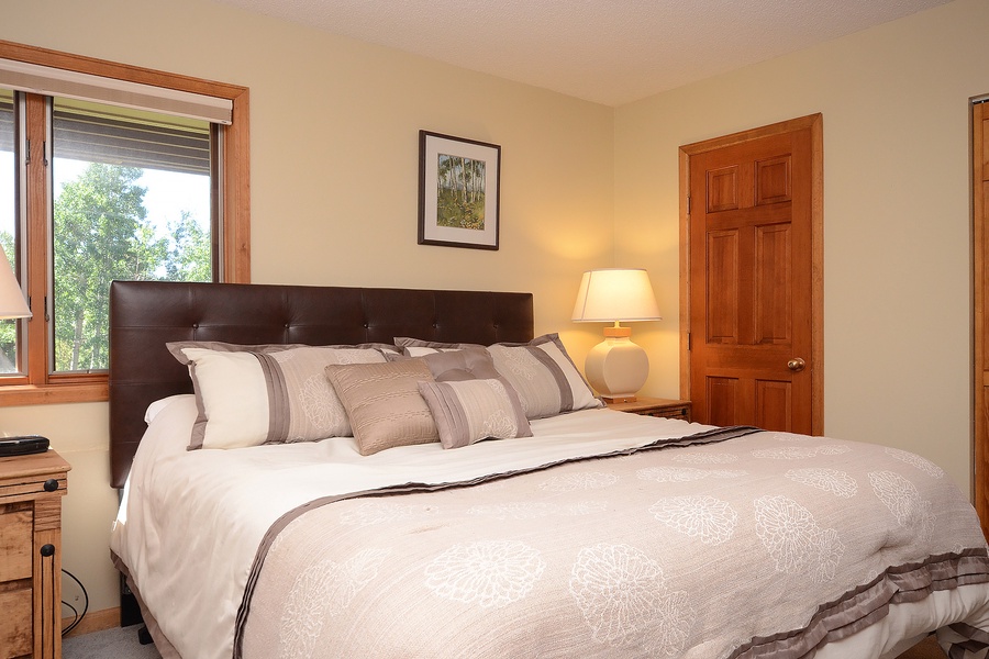 Sink into crisp linens and soft pillows in your private retreat, where natural light and peaceful garden views create the perfect sanctuary for restful nights.