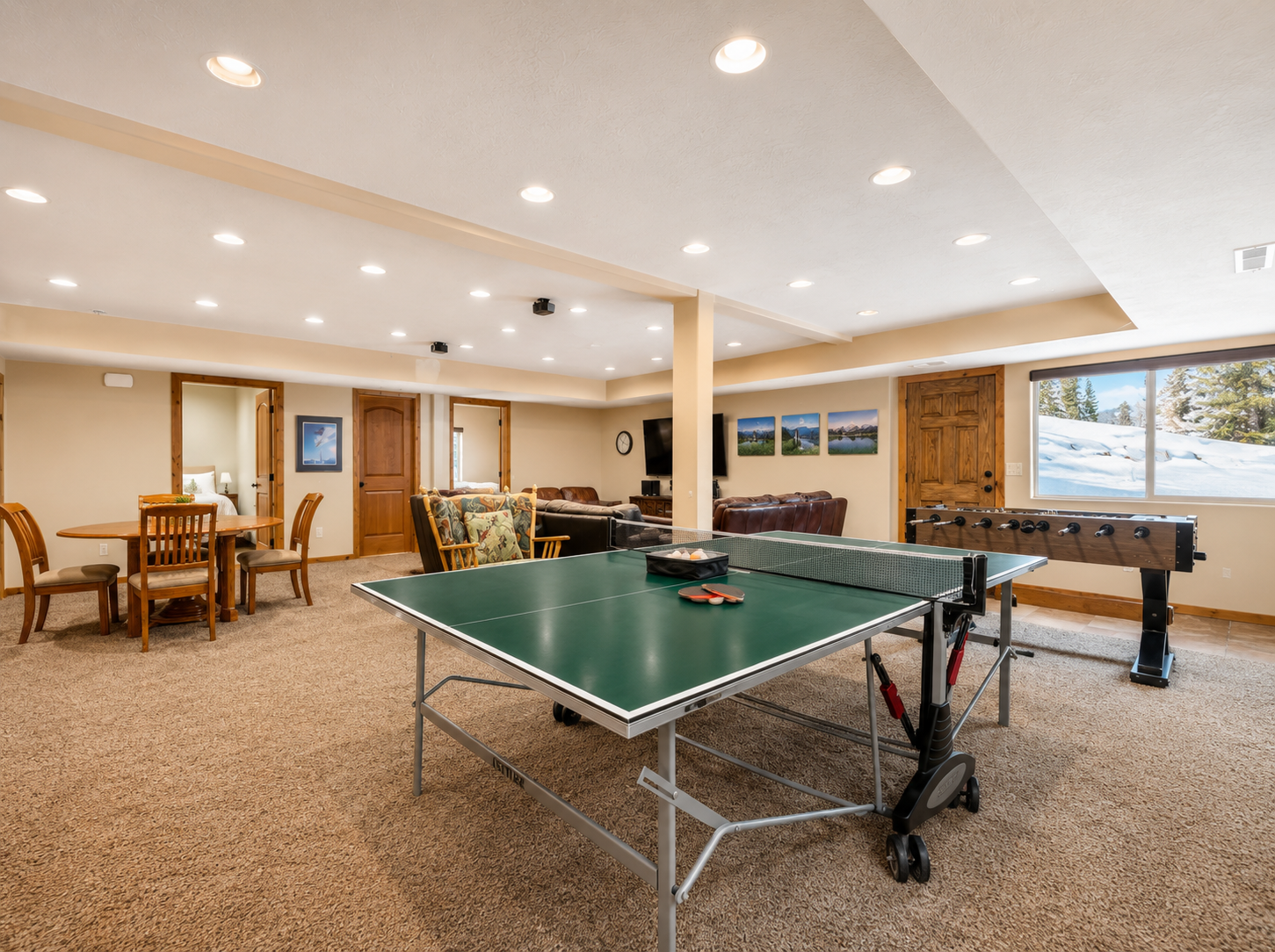 Challenge your crew to friendly competition in this spacious game room, complete with ping pong, foosball, and cozy seating areas for lounging between rounds.