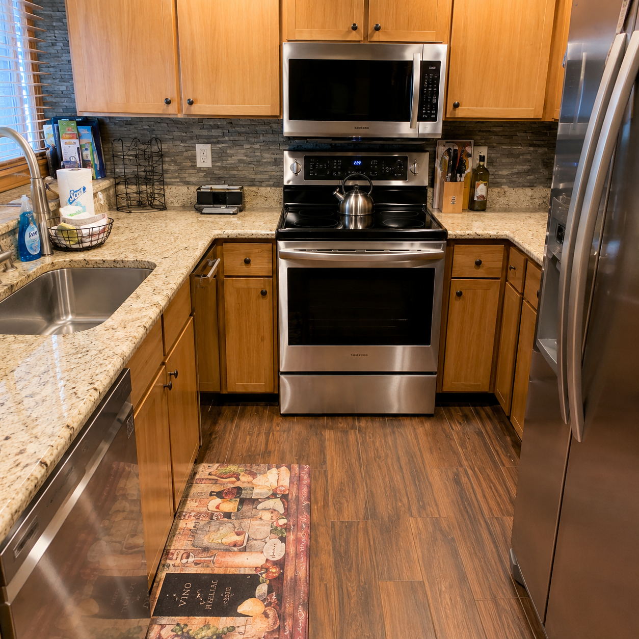 Step into your fully equipped kitchen with modern stainless steel appliances, plenty of counter space, and everything you need to prepare your favorite meals during your stay.