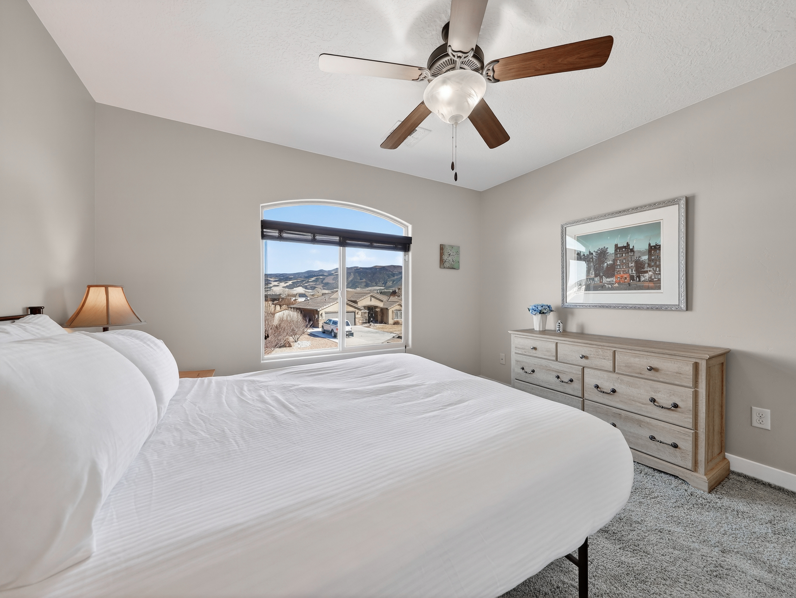 Drift off to peaceful sleep in your comfortable bedroom while gentle mountain vistas stretch beyond your window.