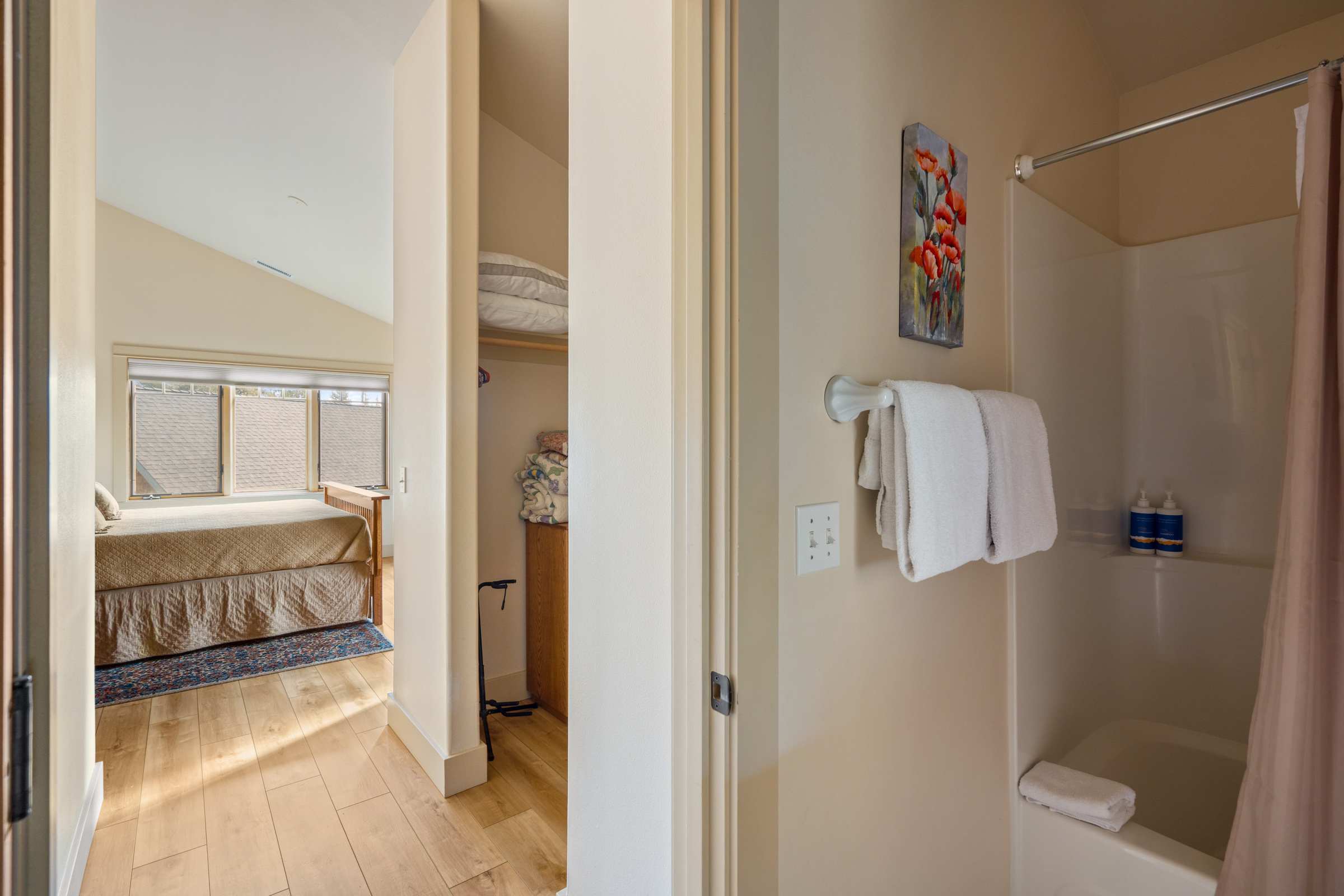 Fresh towels await in your private bathroom, with the cozy bedroom just steps away for ultimate convenience.