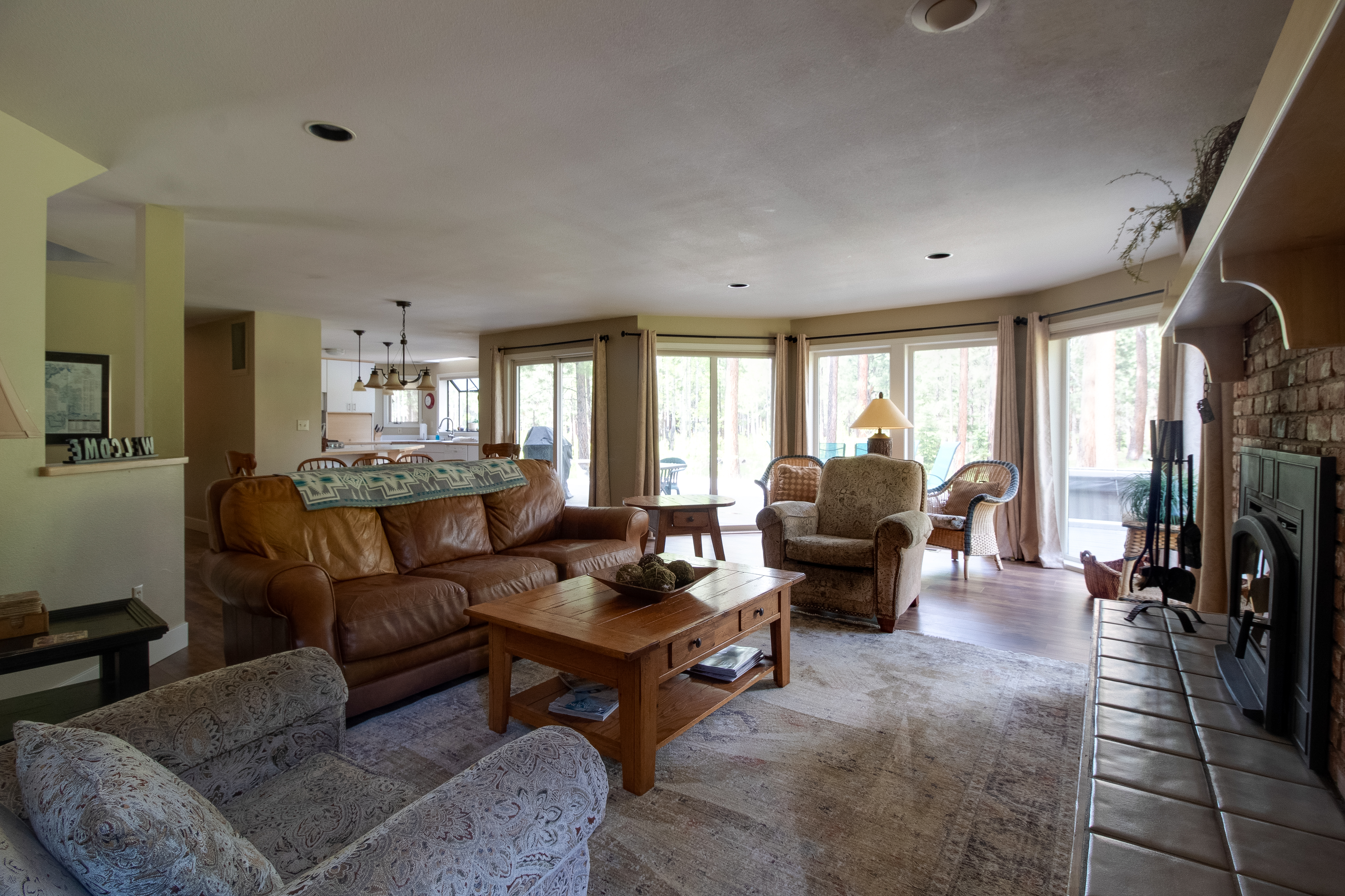 Living Room: Sun-soaked space with rustic charm