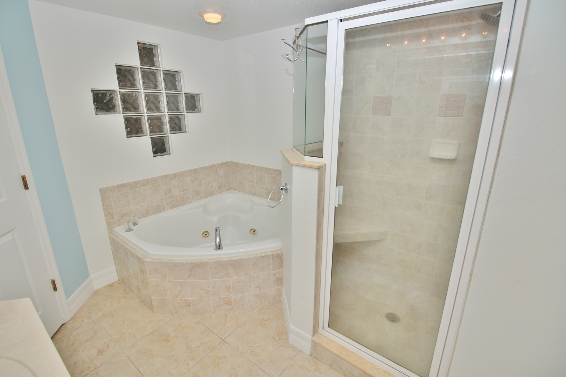 Tub and shower in primary bathroom