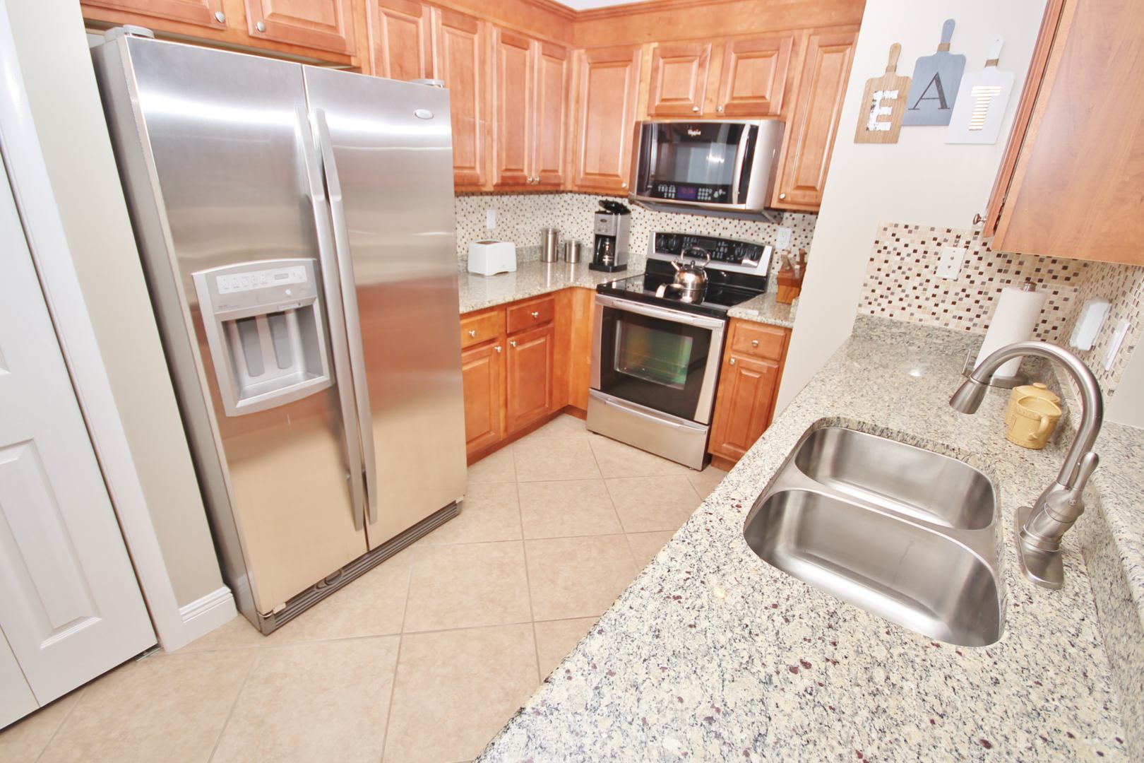 The updated kitchen comes equipped with stainless steel appliances
