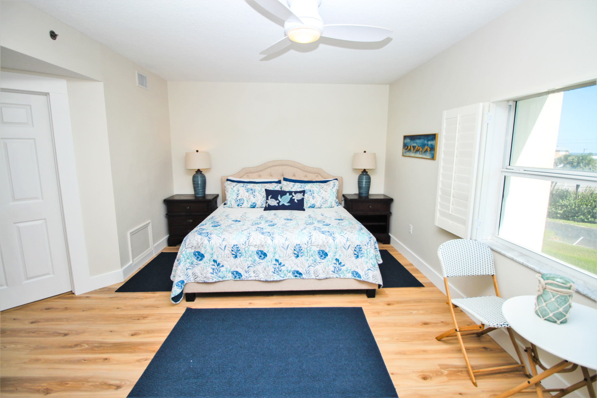 Primary bedroom with blue hues