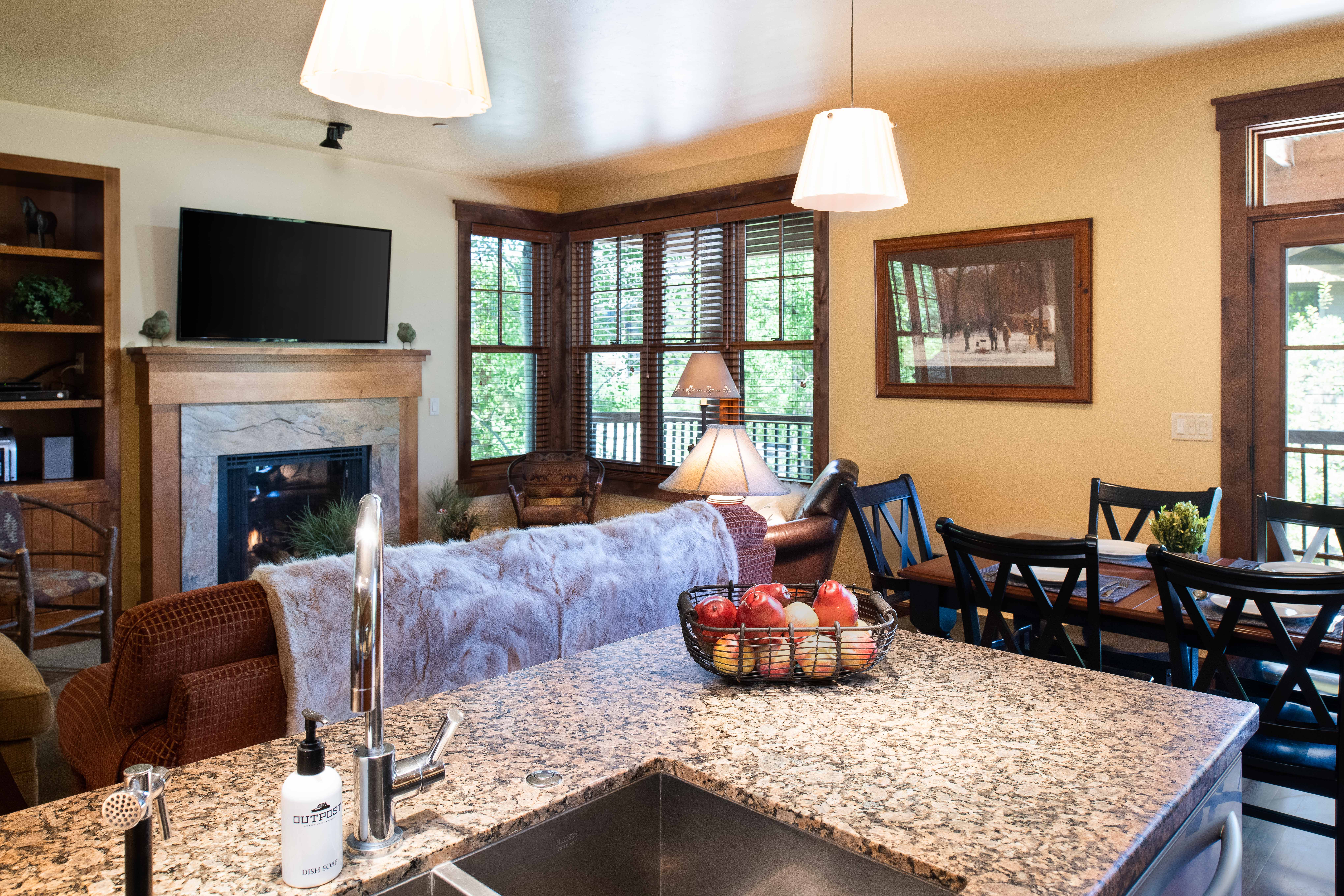 Kitchen looking to living and dining areas