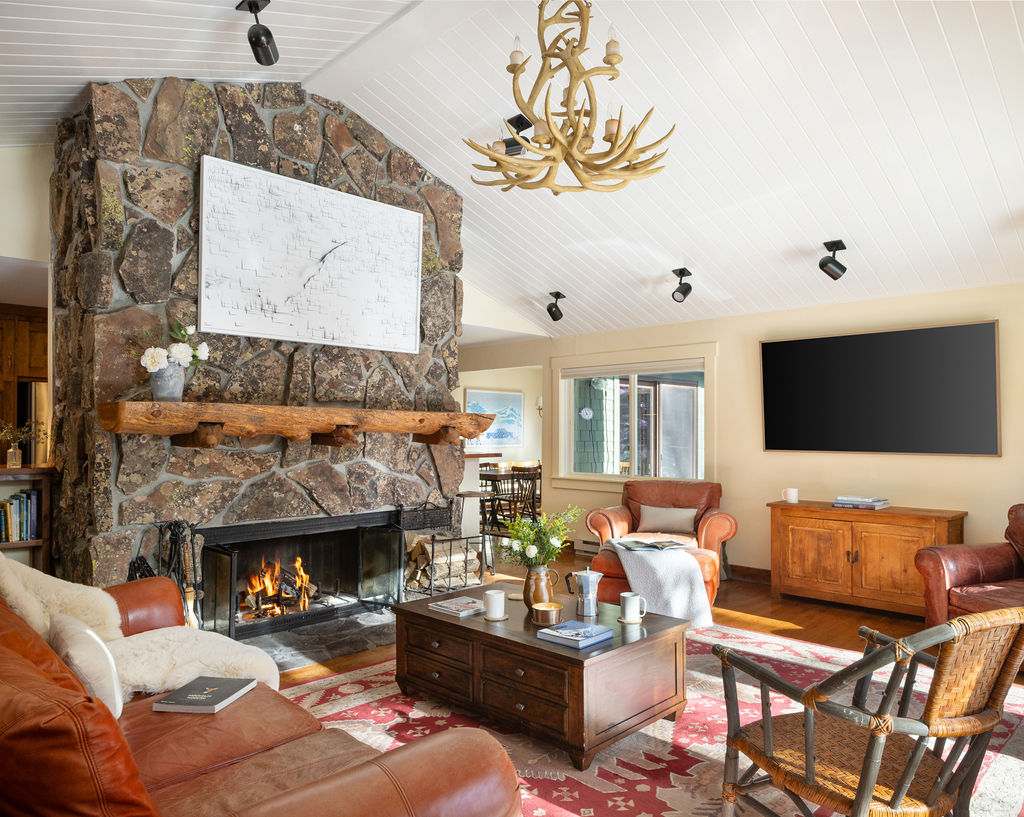 Living room with a wood burning fireplace