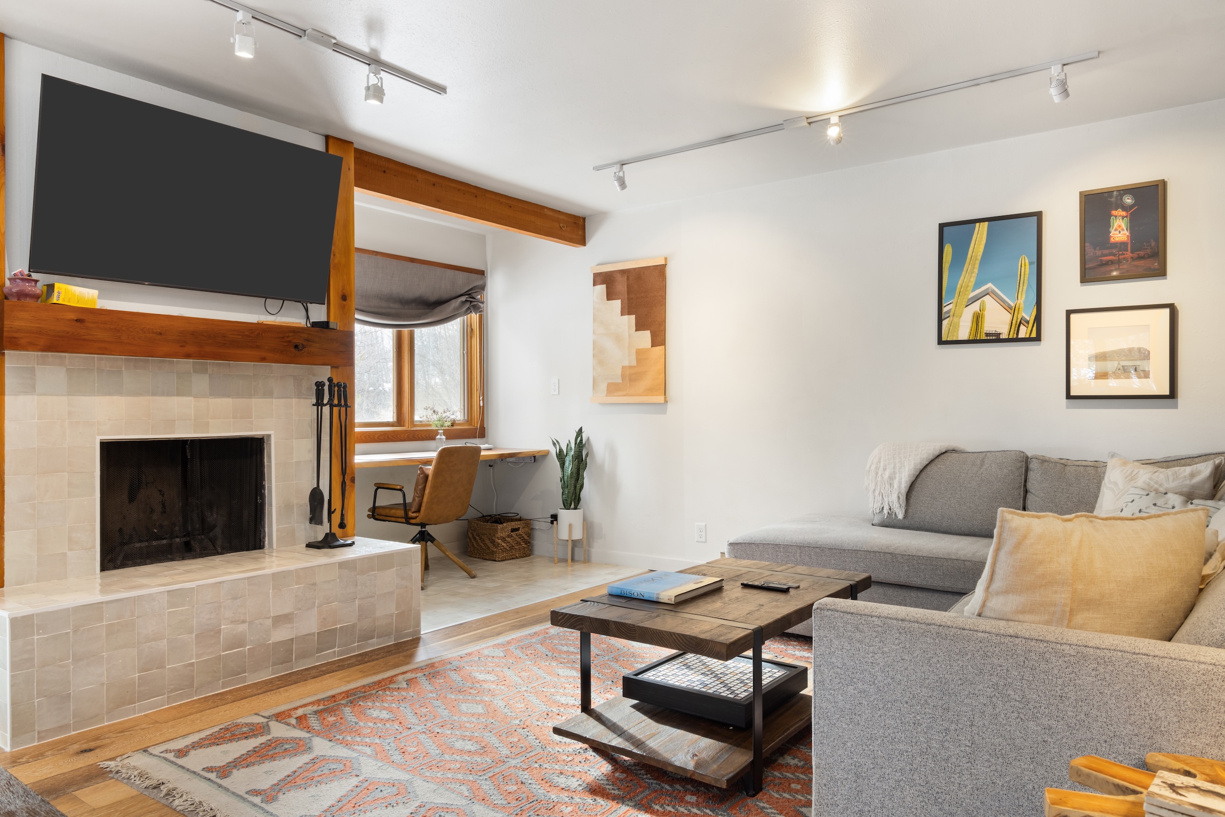 Living Room with Fireplace and Desk
