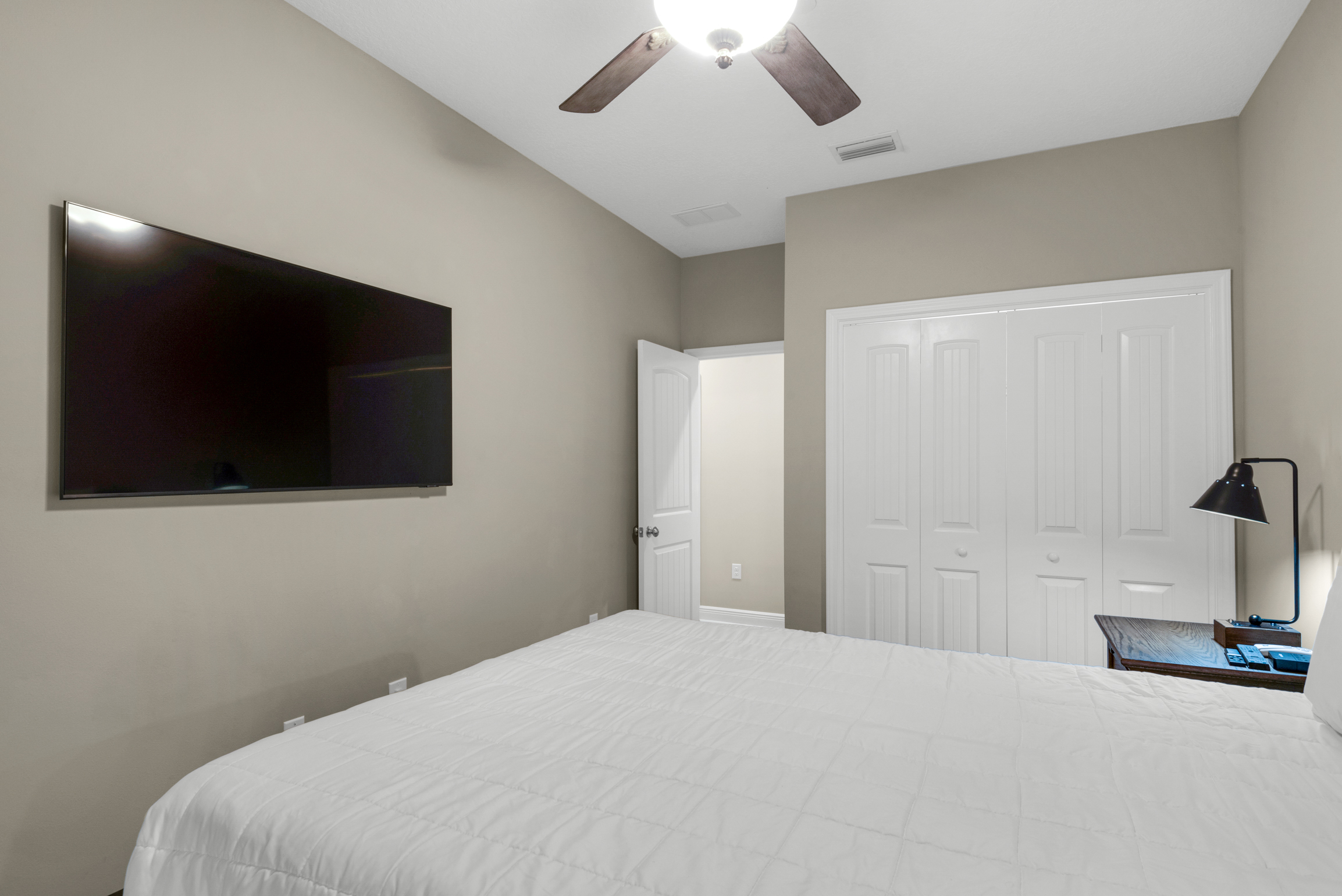 Guest bedroom with flat screen TV