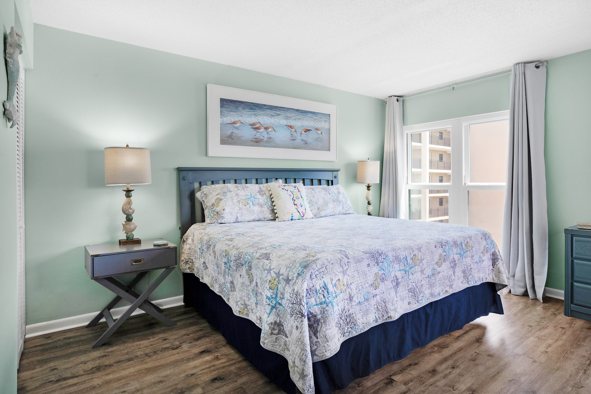 Master bedroom with king meplenty of natural lighting