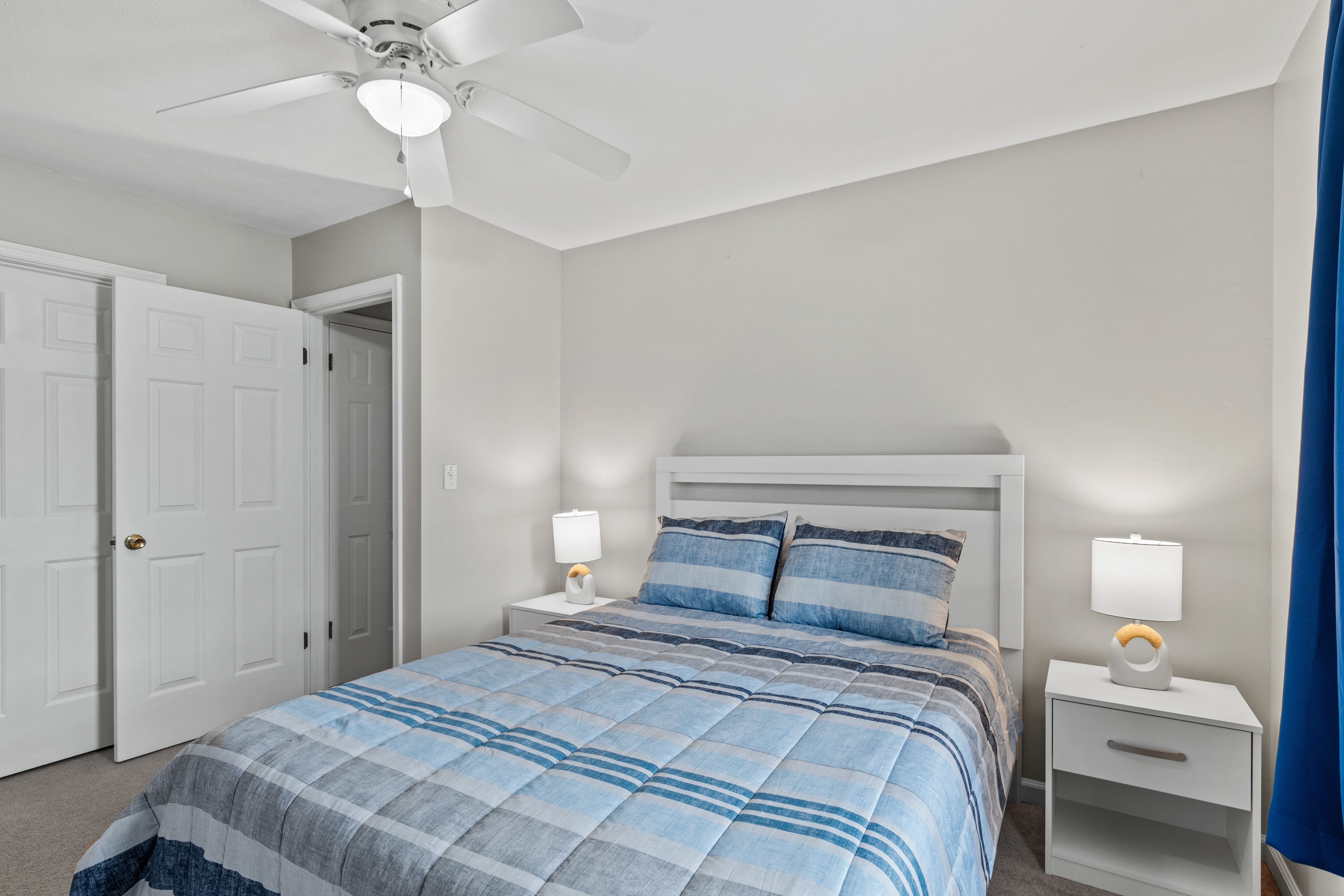 Bedroom 2 offers a plush Queen Bed.