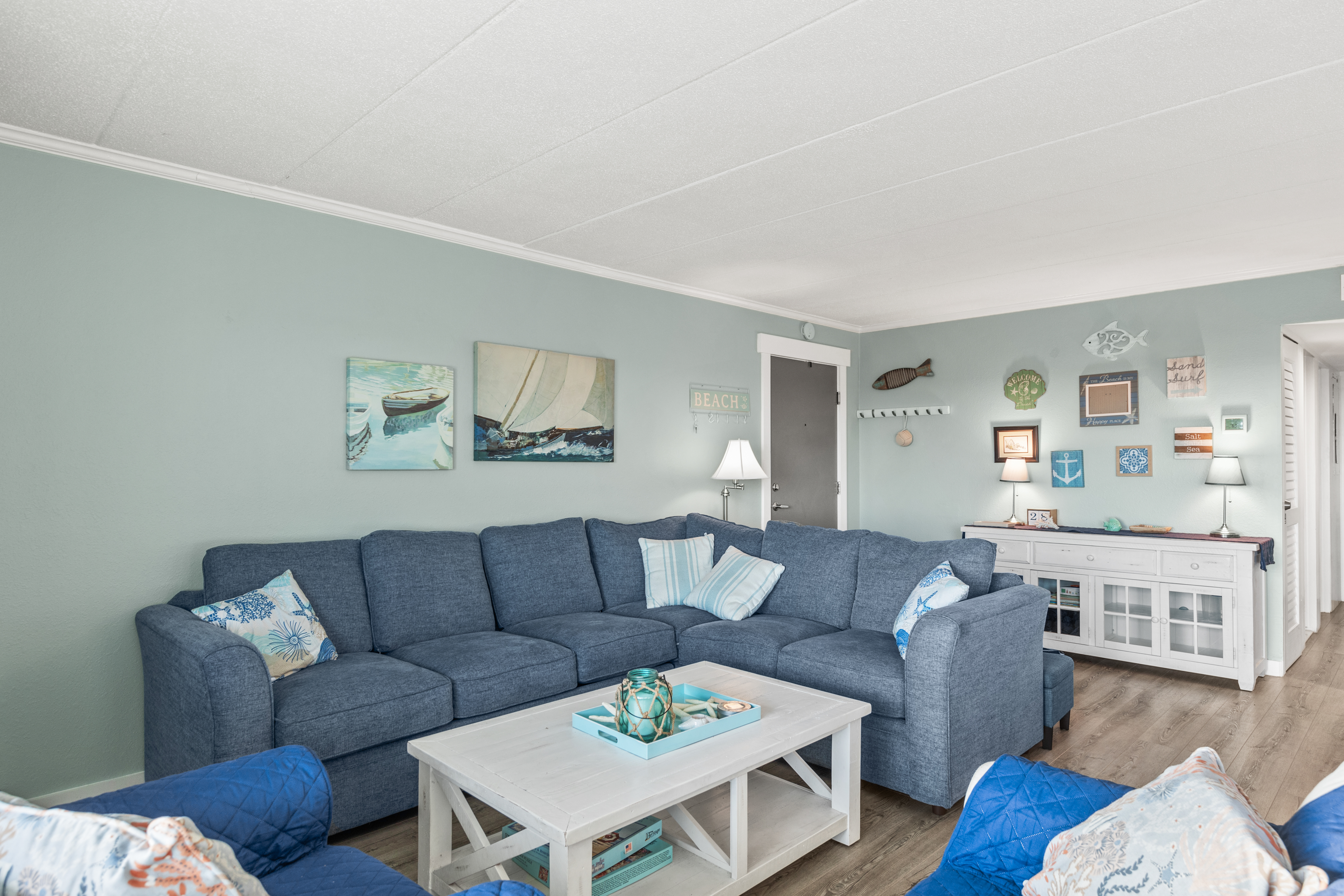 Assateague House 305 offers plenty of bright and beachy seating!
