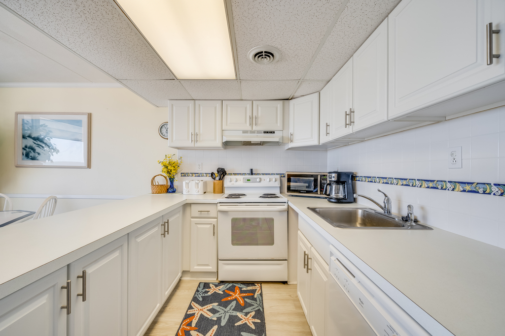Bright, White & Beachy - this Kitchen is sure to WOW!