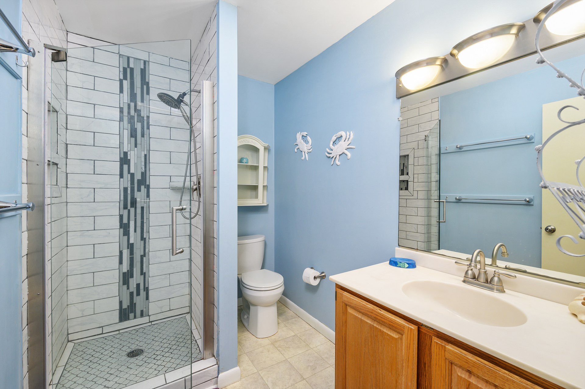 Full Bath 2 is attached to Bedroom 3 and has a Walk-in Shower.