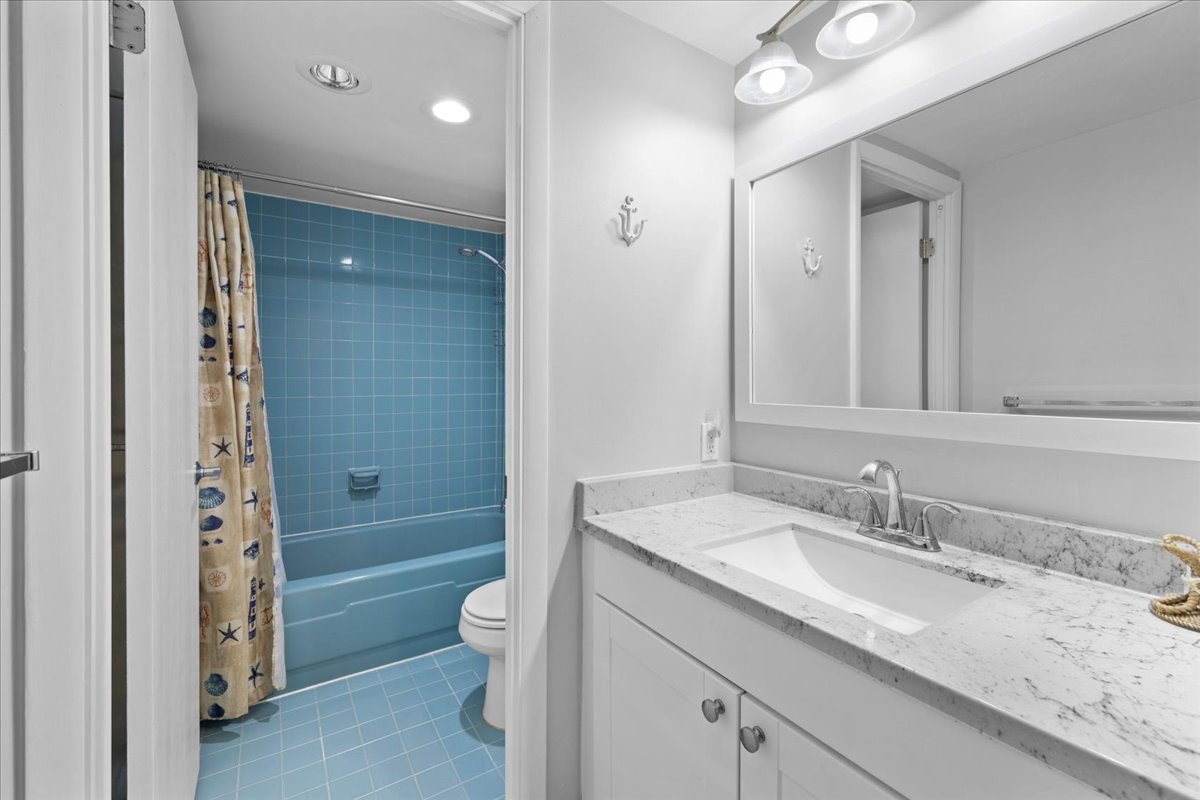 The Full Shared Bath is conveniently located right off of Bedroom 2.