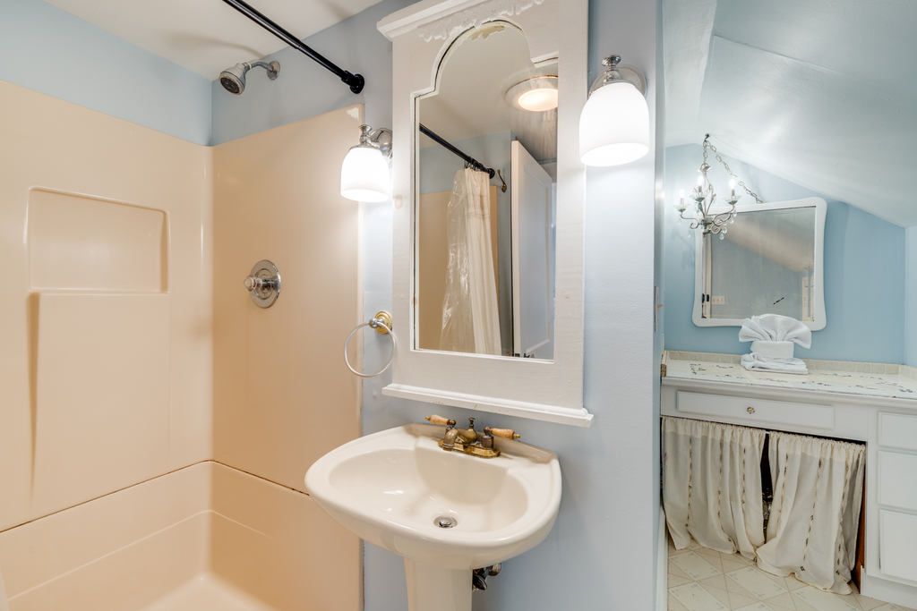 The Master Bath has a Walk-in Shower and Shabby Chic Charm.