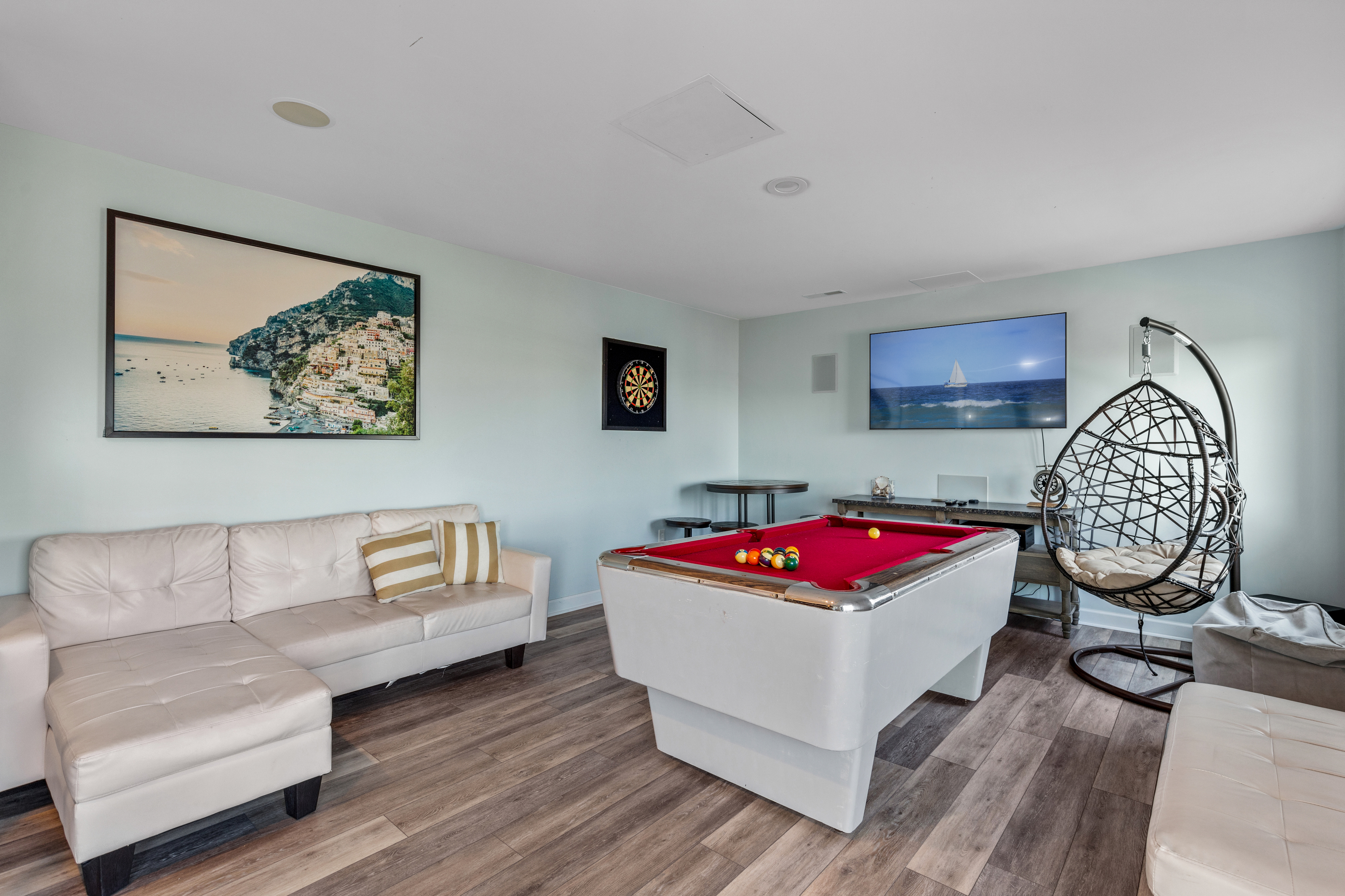 This 1st level is home to a Private Den, Game Area, Billiard Table, and Dart Board!
