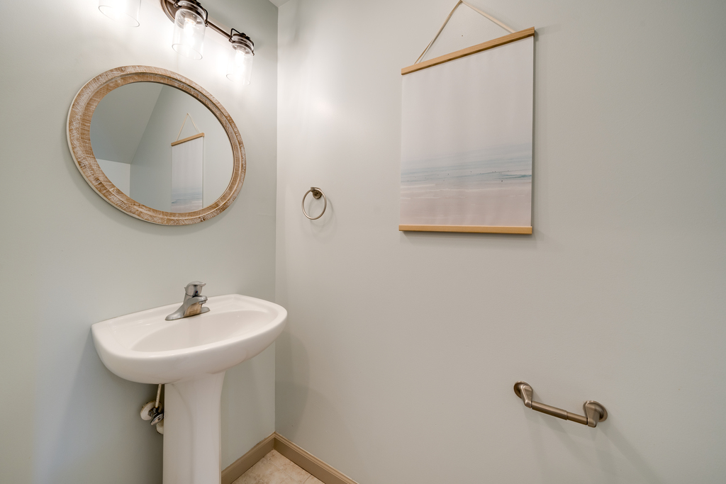 Half Bath conveniently located off Living Area and Kitchen.